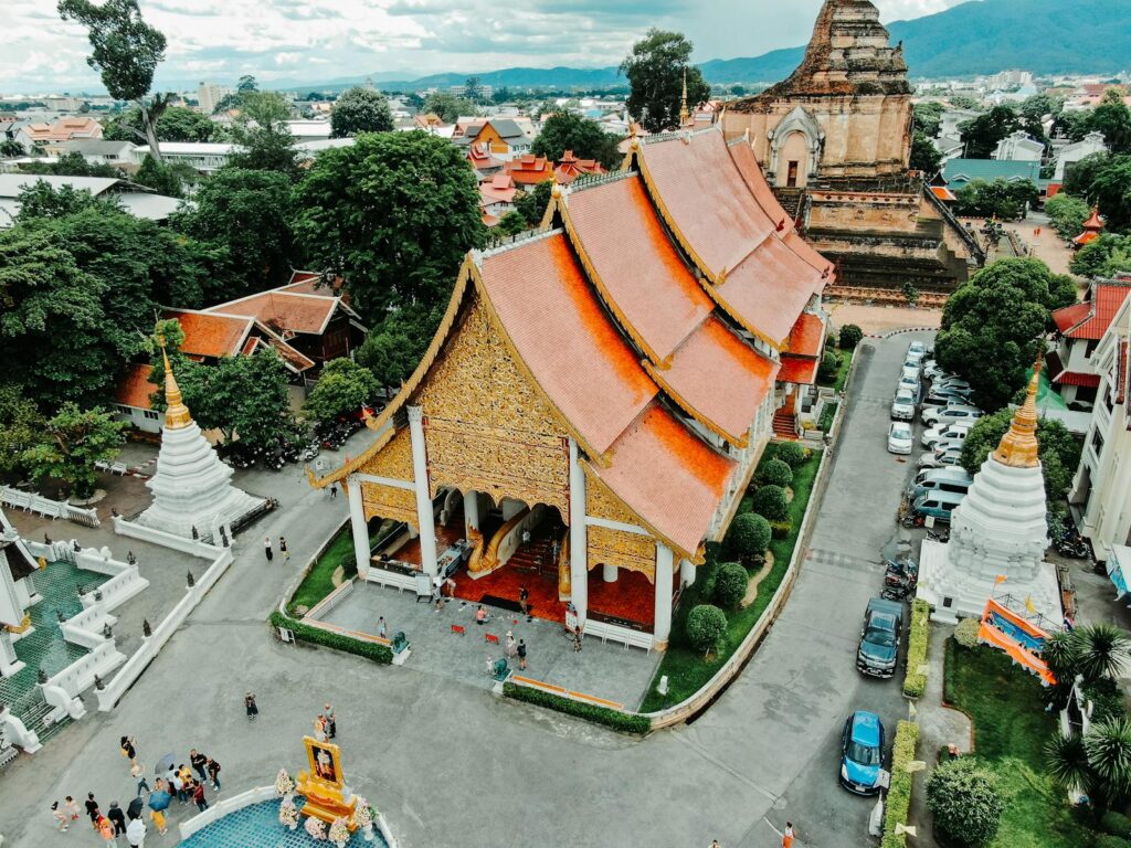 Stunning aerial view of Wat Chedi Luang, showcasing traditional Thai architecture in Chiang Mai, Thailand.