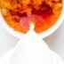 white ceramic bowl with yellow and red food