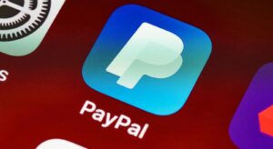 Detailed view of PayPal app icon on a smartphone screen highlighting mobile payment technology.