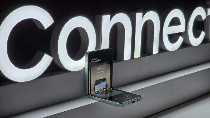 A cell phone is plugged into a connection sign