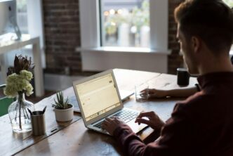 A Guide To Bitcoin DCA 9 man operating laptop on top of table