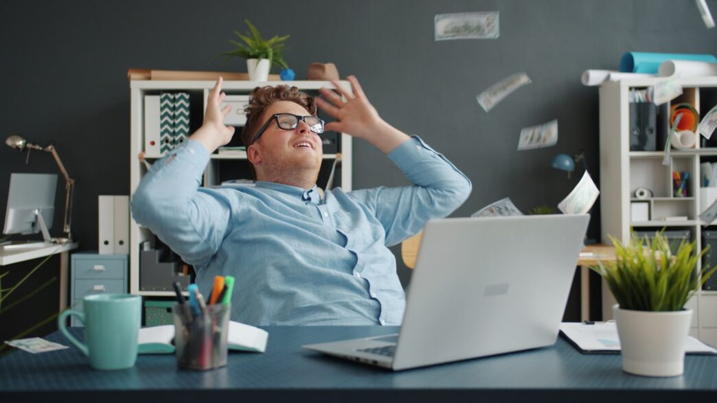 Best Free Satoshis Bitcoin Lightning Faucets 1 Man celebrating with money falling around him