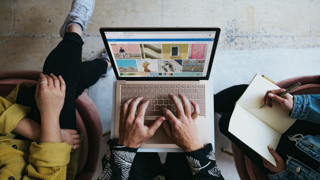 Lightning Transaction Ads and Zapvertising: Reach, Cost, and Conversion Across Emerging Bitcoin Native Ad Channels 1 person using microsoft surface laptop on lap with two other people