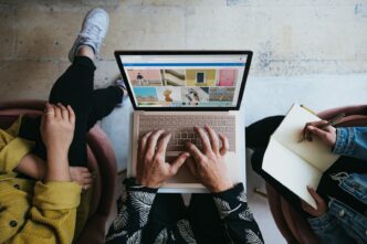 Lightning Transaction Ads and Zapvertising: Reach, Cost, and Conversion Across Emerging Bitcoin Native Ad Channels 3 person using microsoft surface laptop on lap with two other people