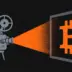 Film projector casting a Bitcoin symbol onto a cinema screen