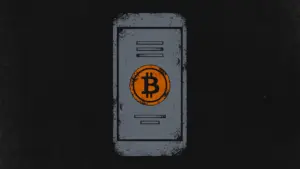 Slate-gray smartphone showing a restaurant menu with a burnt-orange Bitcoin coin as the play button, symbolising Menuvideo's video menus paid in bitcoin.